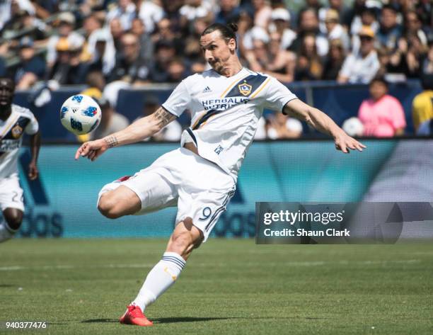 Zlatan Ibrahimovic of Los Angeles Galaxy scores his first goal for the Los Angeles Galaxy during the Los Angeles Galaxy's MLS match against Los...