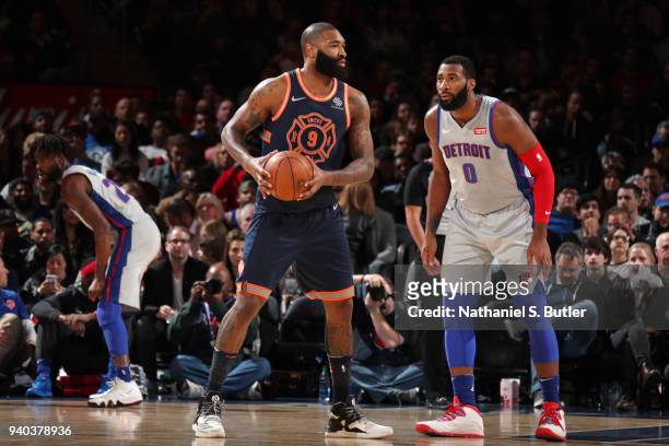 Kyle O'Quinn of the New York Knicks passes the ball during the game against the Detroit Pistons on March 31, 2018 at Madison Square Garden in New...