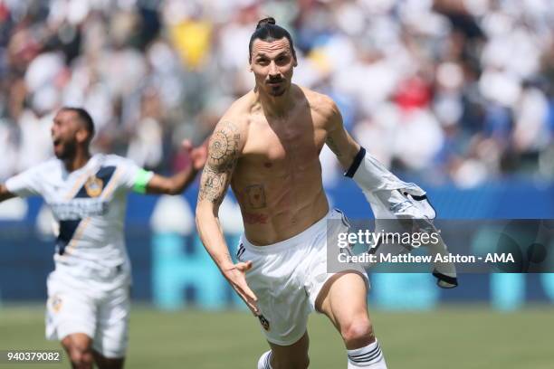 Zlatan Ibrahimovic of Los Angeles Galaxy celebrates after scoring a goal to make it 3-3 during the MLS match between Los Angeles FC and Los Angeles...