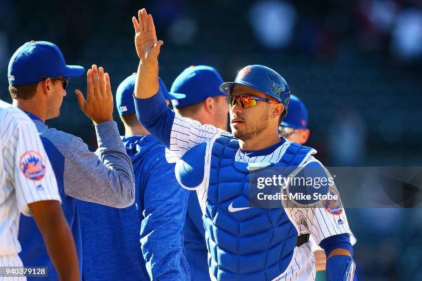 Travis d'Arnaud of the New York Mets celebrates after defeating the St. Louis Cardinals at Citi Field on March 31, 2018 in the Flushing neighborhood...