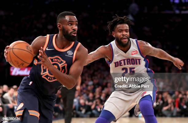 Tim Hardaway Jr. #3 of the New York Knicks dribbles towards the basket against Reggie Bullock of the Detroit Pistons in the third quarter during...