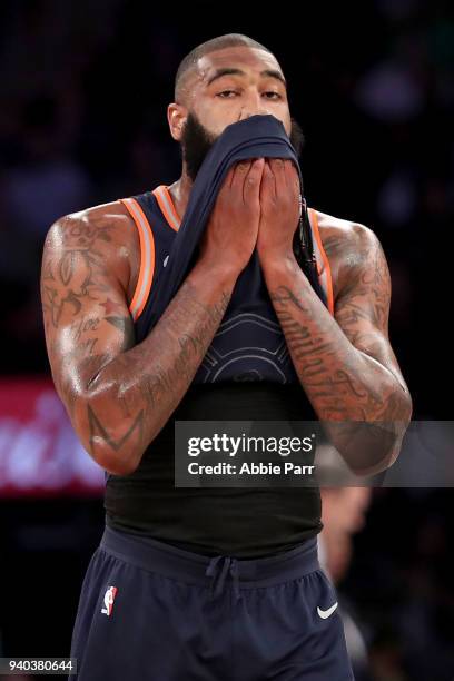 Kyle O'Quinn of the New York Knicks reacts in the final minutes of play in the fourth quarter against the Detroit Pistons during their game at...