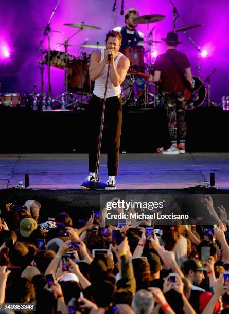 Keyboard/bassist Ben McKee, singer Dan Reynolds and drummer Daniel Platzman perform onstage during Coca-Cola Music at the NCAA March Madness Music...