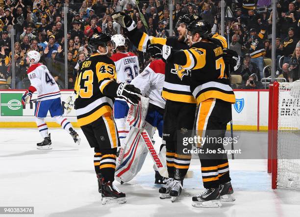 Conor Sheary of the Pittsburgh Penguins celebrates his first period goal against the Montreal Canadiens at PPG Paints Arena on March 31, 2018 in...