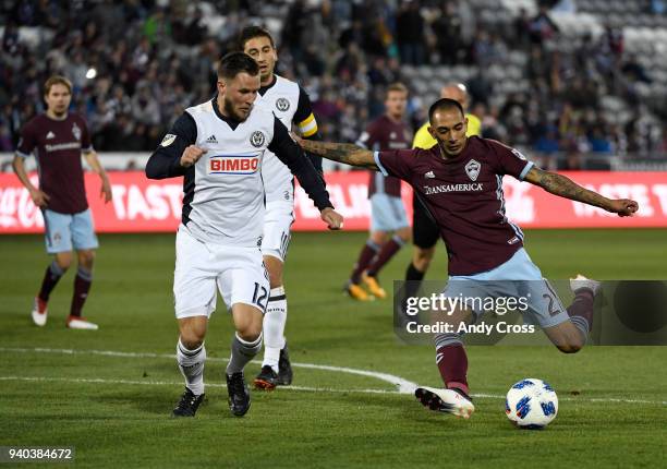 Colorado Rapids defender Edgar Castillo shoots on goal against Keegan Rosenberry, #12, Philadelphia Union in the first half at Dick's Sporting Goods...