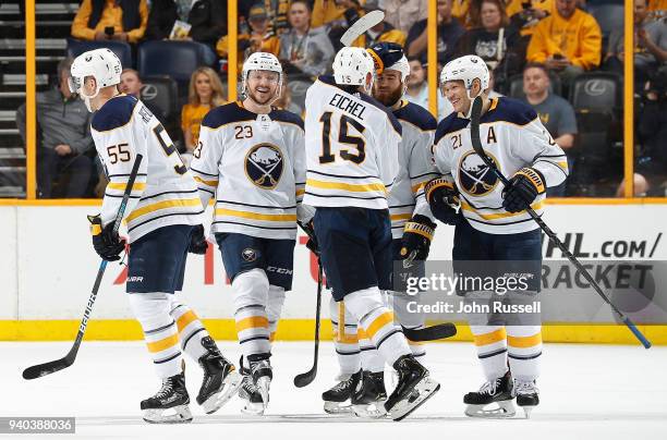 Jack Eichel celebrates a power play goal with Ryan O'Reilly, Kyle Okposo, Sam Reinhart and Rasmus Ristolainen of the Buffalo Sabres against the...