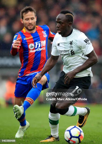 Sadio Mane of Liverpool in action with Yohan Cabaye of Crystal Palace during the Premier League match between Crystal Palace and Liverpool at...