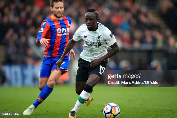 Sadio Mane of Liverpool in action with Yohan Cabaye of Crystal Palace during the Premier League match between Crystal Palace and Liverpool at...