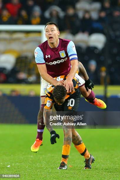 John Terry of Aston Villa clashes with Abel HernÃ¡ndez of Hull City during the Sky Bet Championship match between Hull City and Aston Villa at KCOM...