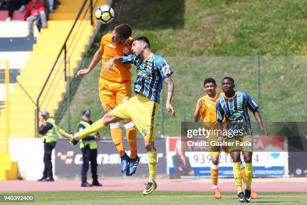 Porto defender Diogo Queiros from Portugal with Real SC midfielder Paulo Silva from Portugal in action during the Portuguese Segunda Liga match...