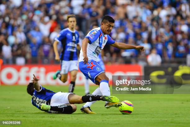 Javier Guemez of Queretaro and Luis Venegas of Puebla fight for the ball during the 13th round match between Queretaro and Puebla as part of the...