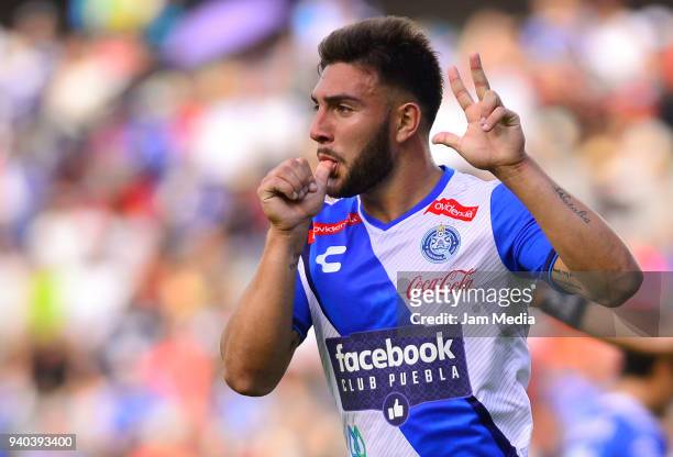 Lucas Cavallini of Puebla celebrates after scoring his team´s first goal during the 13th round match between Queretaro and Puebla as part of the...