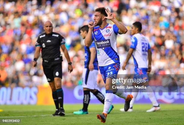 Lucas Cavallini of Puebla celebrates after scoring his team´s first goal during the 13th round match between Queretaro and Puebla as part of the...