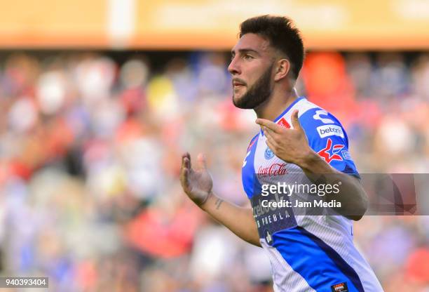 Lucas Cavallini of Puebla celebrates after scoring his team´s first goal during the 13th round match between Queretaro and Puebla as part of the...