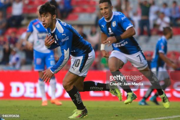 Edson Puch of Queretaro celebrates after scoring his team´s second goal during the 13th round match between Queretaro and Puebla as part of the...