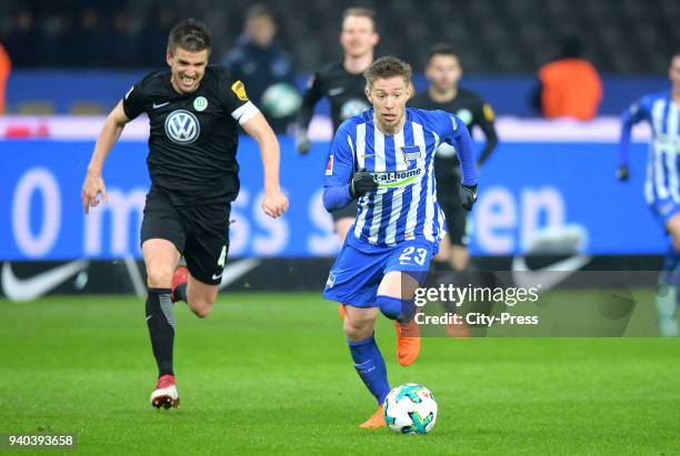 Ignacio Camacho of VfL Wolfsburg and Mitchell Weiser of Hertha BSC during the Bundesliga game between Hertha BSC and VfL Wolfsburg at Olympiastadion...