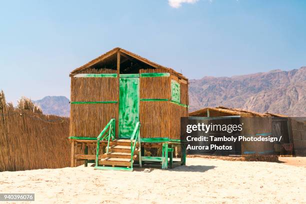 straw huts for accommodation in southern sinai close to nuweiba, egypt - nuweiba stock pictures, royalty-free photos & images