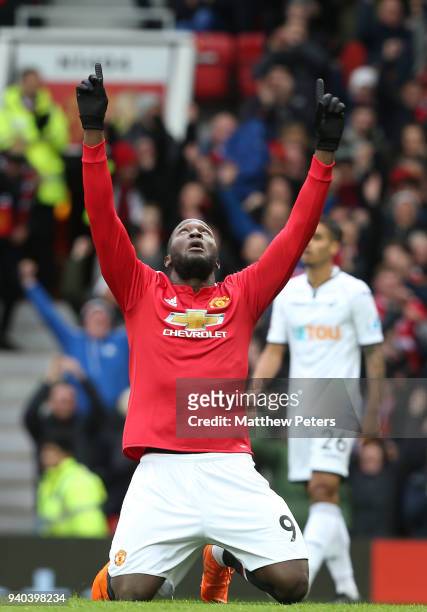 Romelu Lukaku of Manchester United celebrates scoring their first goal during the Premier League match between Manchester United and Swansea City at...