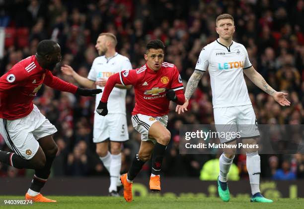 Alexis Sanchez of Manchester United celebrates scoring their second goal during the Premier League match between Manchester United and Swansea City...