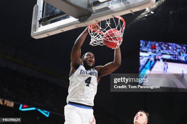 Eric Paschall of the Villanova Wildcats dunks in the second half against the Kansas Jayhawks during the 2018 NCAA Men's Final Four Semifinal at the...