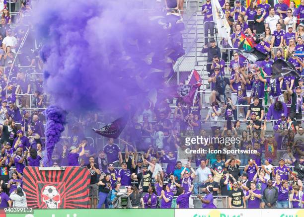 Orlando City fans celebrate a goal from Orlando City forward Dom Dwyer during the MLS soccer match between the Orlando City FC and the NY Red Bulls...