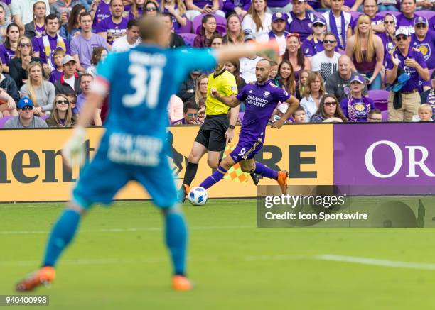 Orlando City forward Justin Meram looks to cross the ball during the MLS soccer match between the Orlando City FC and the NY Red Bulls at Orlando...