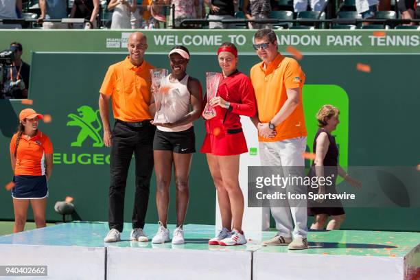 Sloane Stephens and Jelena Ostapenko during the trophy ceremony of the Womens Final of the Miami Open Presented by Itau at Crandon Park Tennis Center...