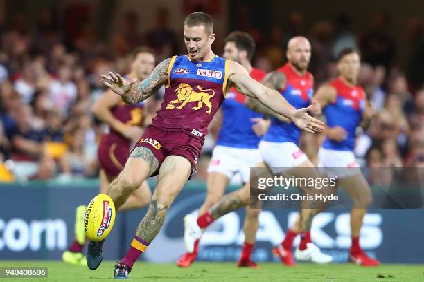 Dayne Beams of the Lions kicks during the round two AFL match between the Brisbane Lions and the Melbourne Demons at The Gabba on March 31, 2018 in...