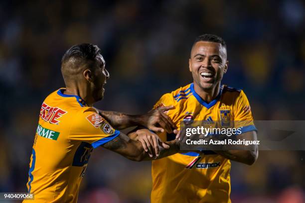 Rafael Carioca of Tigres celebrates with teammate Ismael Sosa after scoring his team's second goal during the 13th round match between Tigres UANL...