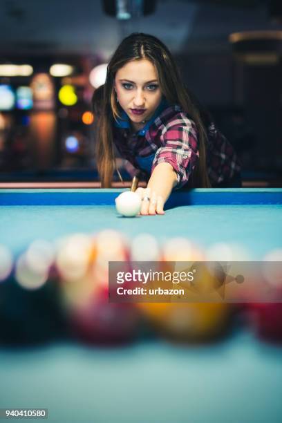 young beautiful woman and plays billiard and have fun. - snooker break stock pictures, royalty-free photos & images