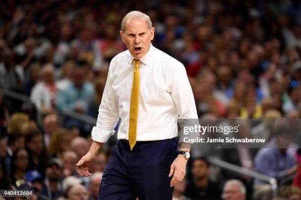 Head coach John Beilein of the Michigan Wolverines reacts during the first half against the Loyola Ramblers in the 2018 NCAA Photos via Getty Images...