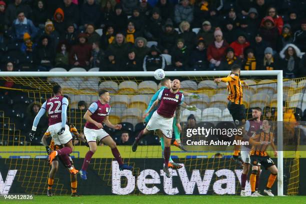 Alan Hutton of Aston Villa blocks a header during the Sky Bet Championship match between Hull City and Aston Villa at KCOM Stadium on March 31, 2018...