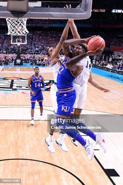 Silvio De Sousa of the Kansas Jayhawks shoots the ball against the Villanova Wildcats during the first half in the 2018 NCAA Photos via Getty Images...