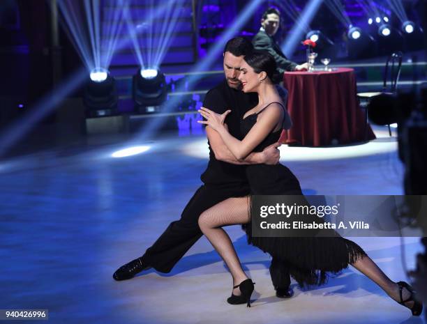 Actor Raoul Bova and wife Rocio Munoz Morales perform on the Italian TV show 'Ballando Con Le Stelle' at RAI Auditorium on March 31, 2018 in Rome,...