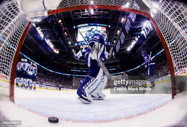 Curtis McElhinney of the Toronto Maple Leafs skates away after being scored on by Andrew Copp of the Winnipeg Jets during the third period at the Air...
