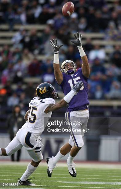 Wide receiver Jermaine Kearse of the Washington Huskies makes a leaping catch against Bryant Nnabuife of the California Bears on December 5, 2009 at...