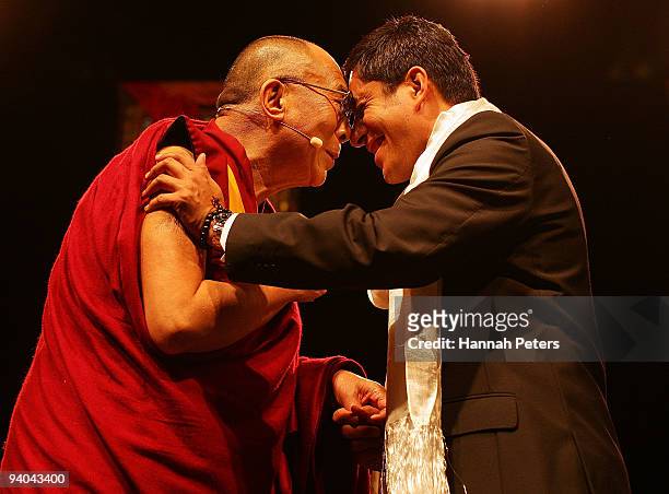 His Holiness the 14th Dalai Lama greets Robert Rakete at the Vector Arena on December 5, 2009 in Auckland, New Zealand. His Holiness the 14th Dalai...
