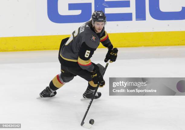 Vegas Golden Knights defenseman Colin Miller controls the puck during the second period of a regular season game between the San Jose Sharks and the...