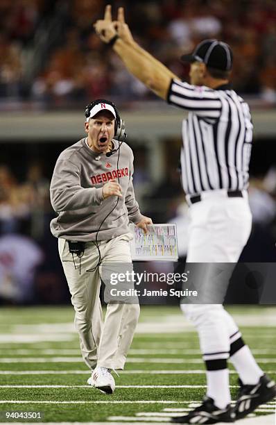 Head coach Bo Pelini of the Nebraska Cornhuskers yells at the referees during the third quarter of the game the Texas Longhorns at Cowboys Stadium on...