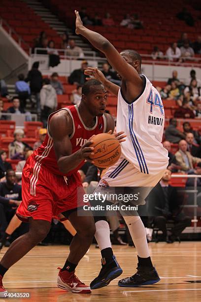 Joey Dorsey of the Rio Grande Valley Vipers drives past DeVon Hardin of the Tulsa 66ers as the Rio Grande Valley Vipers play the Tulsa 66ers in NBA...