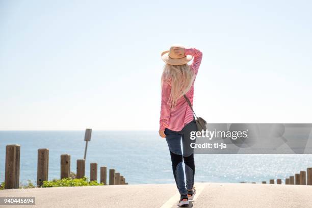 enjoying a beautiful view of an ocean - malibu beach stock pictures, royalty-free photos & images