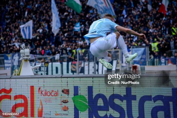 Ciro Immobile celebrates under the Curva Nord aftre score goal 4-2 during the Italian Serie A football match between S.S. Lazio and Benevento at the...