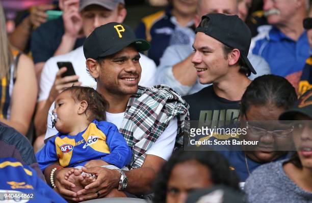 Cyril Rioli of the Hawks and Daniel Rioli of the Tigers watch the match from the crowd during the round two AFL match between the Western Bulldogs...