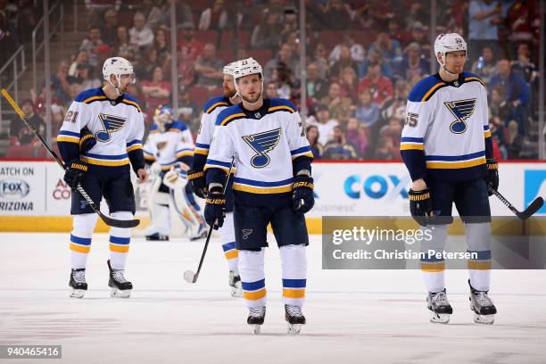 Vladimir Sobotka of the St. Louis Blues skates back to the bench with Patrik Berglund, Kyle Brodziak and Colton Parayko during the second period of...