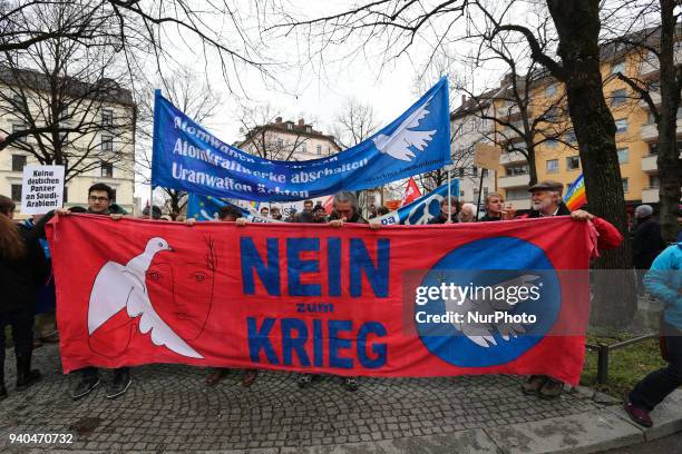 Front banner saying 'Nein zum Krieg' - 'No to war'. Some thousand joined the Ostermarsch for peace and disarmament, in Munich, Germany, on March 31,...