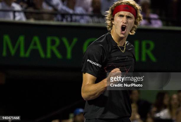 Alexander Zverev, from Germany, reacts after winning a point against Pablo Carreno Busta, from Spain, during his semi final match at the Miami Open...