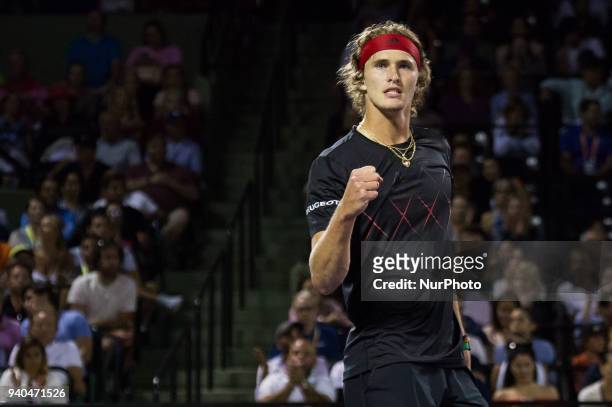 Alexander Zverev, from Germany, reacts after winning a point against Pablo Carreno Busta, from Spain, during his semi final match at the Miami Open...