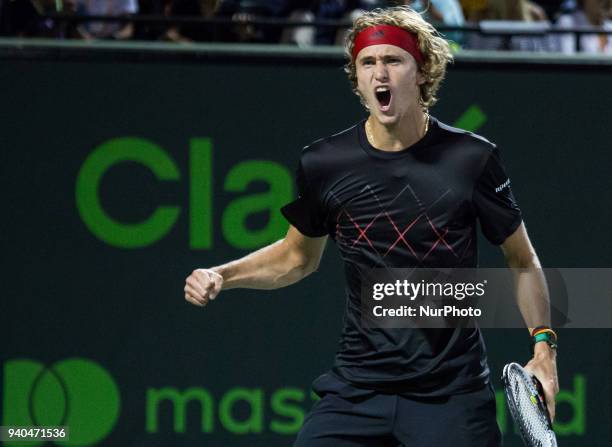 Alexander Zverev, from Germany, reacts after winning a point against Pablo Carreno Busta, from Spain, during his semi final match at the Miami Open...