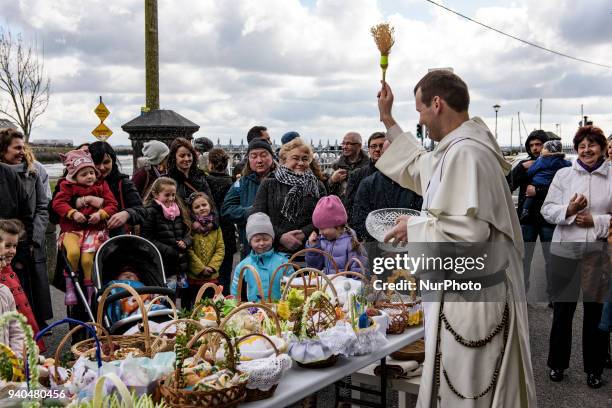 Priest blesses Easter baskets ahead of the Christian feast of Easter at The St Mary's Church, Claddagh on Saterday , March 31 in Galway, Ireland....