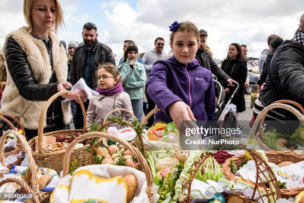 Family during the ceremony of blessing Easter basketsat The St Mary's Church, Claddagh on Saterday , March 31 in Galway, Ireland. Polish Catholics...